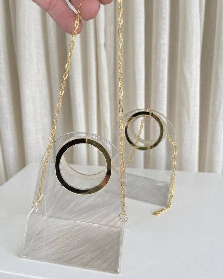 شنتة اكريلك شفاف مع سلسلة نحاس