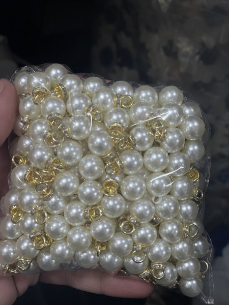 خرز مع فتحة تعليقة